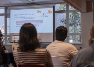 Vivoir rempli des participantes et participants à l'Intercaf 2024.